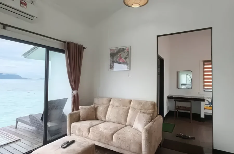 Water villa sofa balcony seaview - private island resort near Semporna
